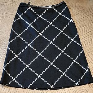 Classic mid length vintage skirt with pearl belt size 10